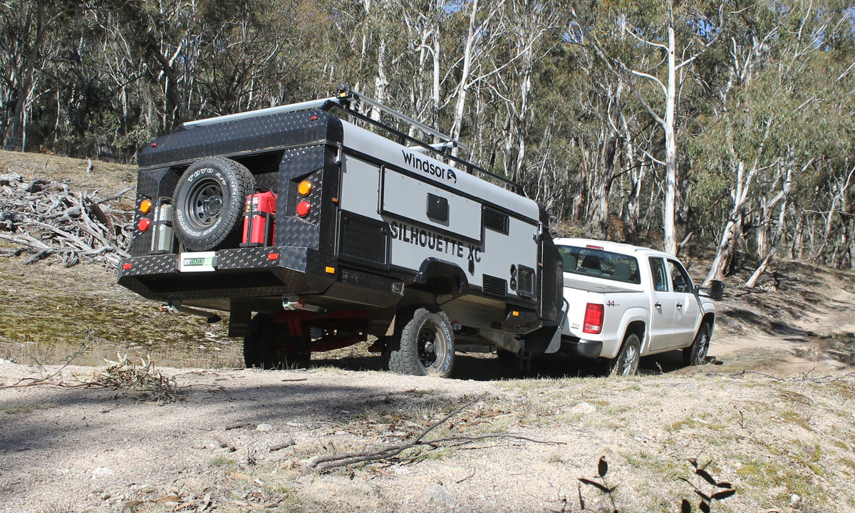 4x4 towing an off-road camper trailer